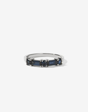 Meadowlark Jewellery’s modern Stella Engagement Ring in Platinum, claw set with two baguette cut blue sapphires and three round brilliant cut blue sapphires. Atop a fine square band. Fully traceable and ethically sourced blue and green sapphires from Queensland, Australia. A Ceremonial design made to order in New Zealand. Wear as a wedding band with our Hilma Ring or alternative engagement ring.