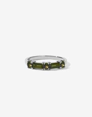 Meadowlark Jewellery’s modern Stella Engagement Ring in Platinum, claw set with two baguette cut green sapphires and three round brilliant cut green sapphires. Atop a fine square band. Fully traceable and ethically sourced blue and green sapphires from Queensland, Australia. A Ceremonial design made to order in New Zealand. Wear as a wedding band with our Hilma Ring or alternative engagement ring.