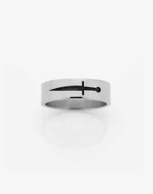 A simple sterling silver band ring with an etched and oxidised dagger design.