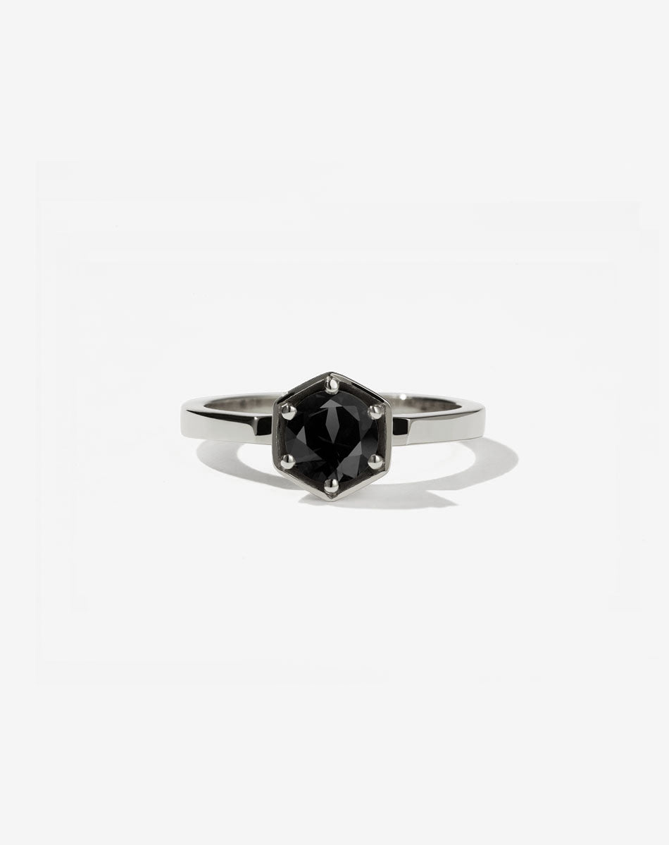 Meadowlark Jewellery’s classic Hexagon Solitaire Engagement Ring in 14ct White Gold, claw set with a 0.60ct round brilliant cut white diamond atop a fine square band. A minimalist, yet bold Ceremonial design made to order in New Zealand.