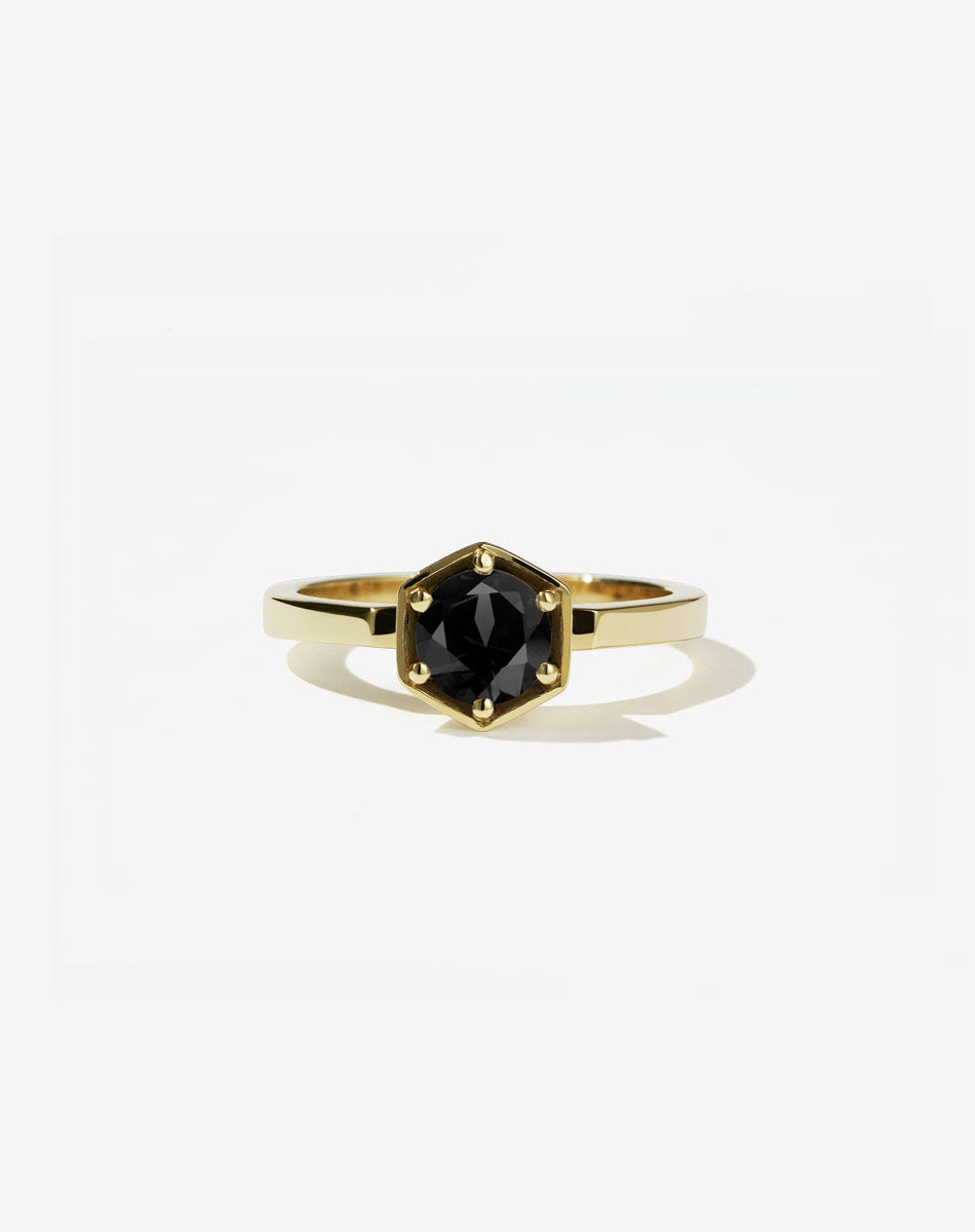 Meadowlark Jewellery’s classic Hexagon Solitaire Engagement Ring in 14ct Yellow Gold, claw set with a 0.60ct round brilliant cut white diamond atop a fine square band. A minimalist, yet bold Ceremonial design made to order in New Zealand.