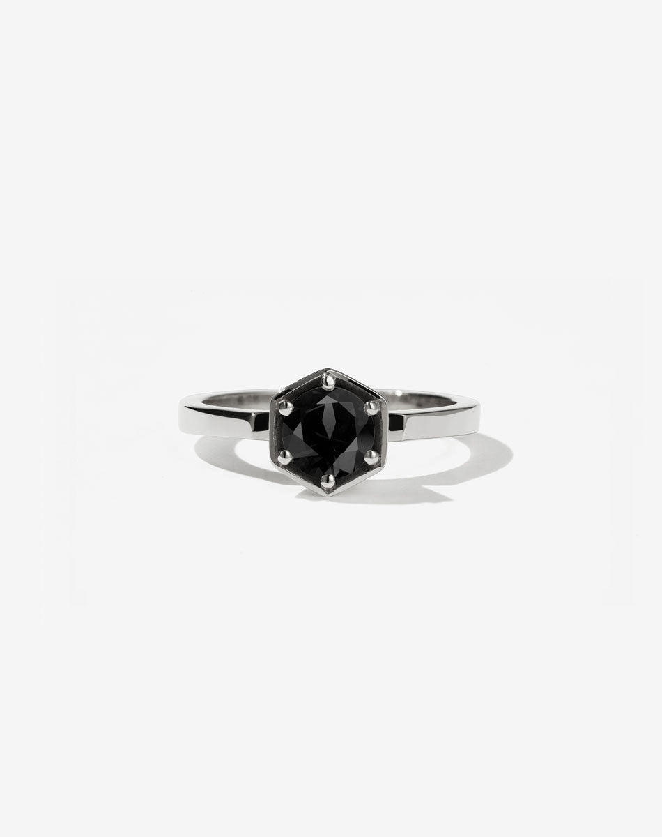  Meadowlark Jewellery’s classic Hexagon Solitaire Engagement Ring in Platinum, claw set with a 0.60ct round brilliant cut white diamond atop a fine square band. A minimalist, yet bold Ceremonial design made to order in New Zealand.