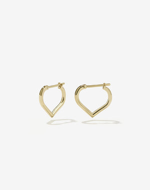 A pair of small heart-shaped hoop earrings made of gold.