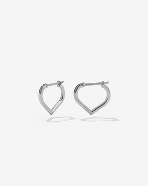 A pair of heart shaped sterling silver hoop earrings.