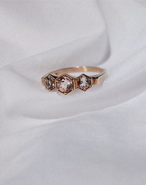 Meadowlark Jewellery’s classic 3 Hexagon Stone Engagement Ring in 9ct Yellow Gold claw set with round brilliant cut morganite. A bold and beloved 3 stone ring, this Ceremonial design is made to order in New Zealand.