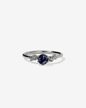 Floral Engagement Ring in white Gold with blue sapphire.