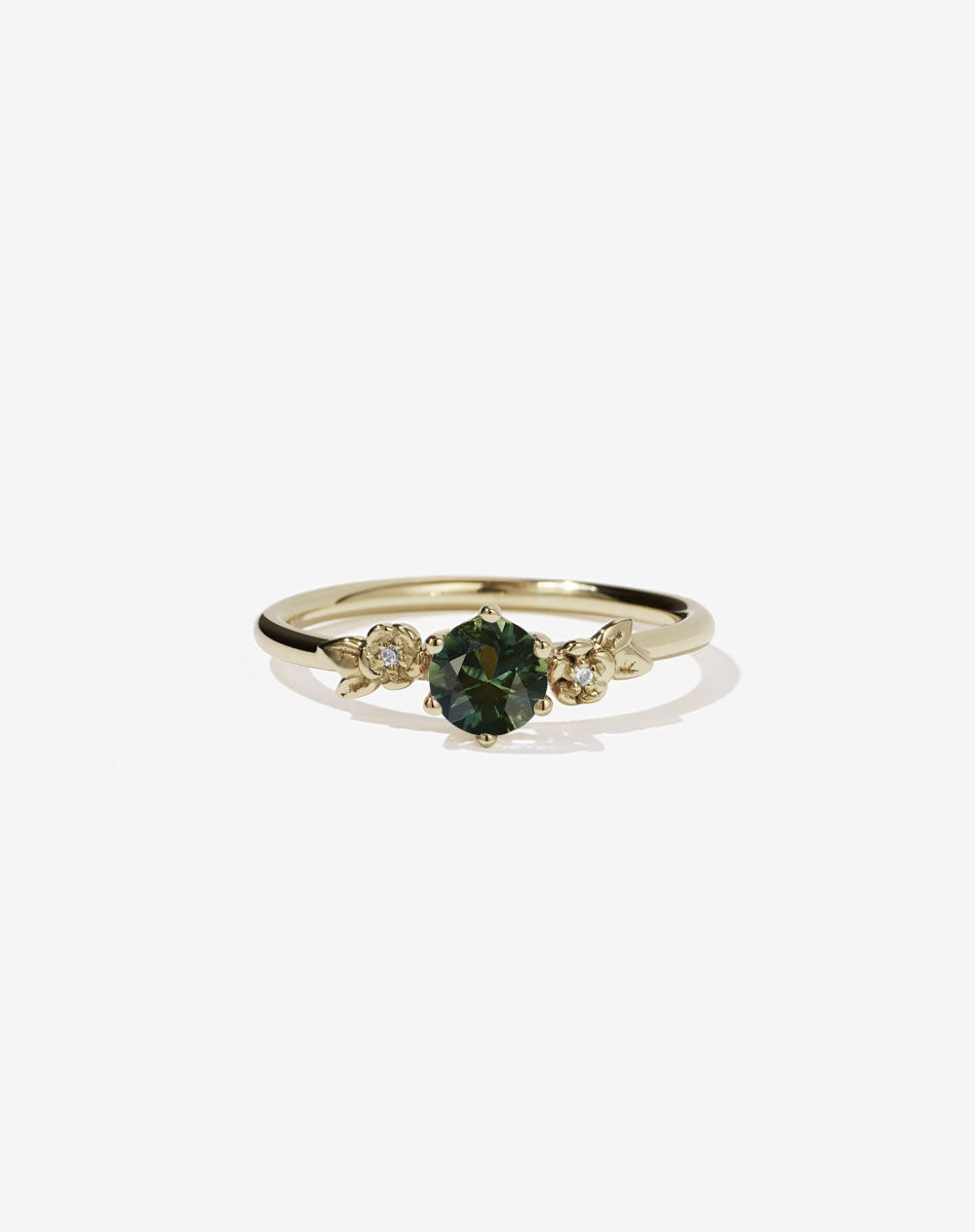 Floral Engagement Ring in yellow Gold with white diamond.