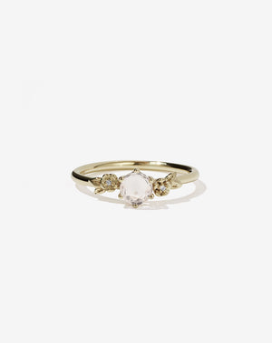 Meadowlark Jewellery’s iconic Alba Engagement Ring in 14ct Yellow Gold, claw set with a round brilliant cut morganite. Round band adorned with flowers, set with round brilliant cut white diamonds. Pair with our bestseller, the Alba Band Stone Set or Plain. Made in New Zealand.