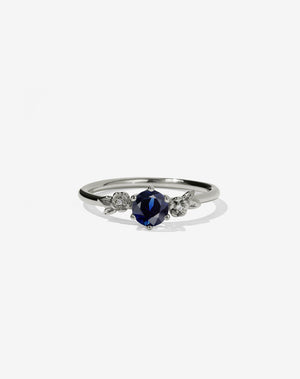 Floral Engagement Ring in white Gold with blue sapphire.