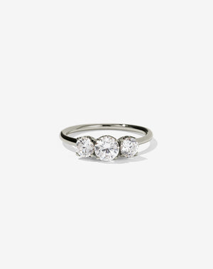 A classic three stone engagement ring in white gold with diamonds.