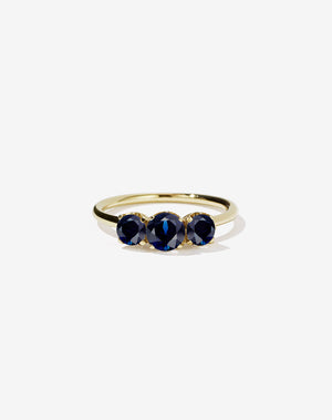 Meadowlark Jewellery’s classic Signature 3 Stone Engagement Ring in 14ct Yellow Gold, with round brilliant cut blue sapphires. Fully traceable and ethically sourced blue and green sapphires from Queensland, Australia. Set into our signature Meadowlark claw setting, featuring graphic lines inspired by our insignia. Pair with our bestseller, the Amelie Band Pave or Plain. One of our most timeless and beloved Ceremonial designs, made to order in New Zealand.
