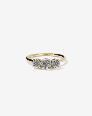 Meadowlark Jewellery’s classic Signature 3 Stone Engagement Ring in 14ct Yellow Gold, with 1ct round brilliant cut grey diamonds. Set into our signature Meadowlark claw setting, featuring graphic lines inspired by our insignia. Pair with our bestseller, the Amelie Band Pave or Plain. One of our most timeless and beloved Ceremonial designs, made to order in New Zealand.