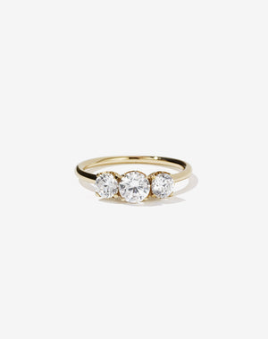 Meadowlark Jewellery’s classic Signature 3 Stone Engagement Ring in 14ct Yellow Gold, with 1ct round brilliant cut white diamonds. Set into our signature Meadowlark claw setting, featuring graphic lines inspired by our insignia. Pair with our bestseller, the Amelie Band Pave or Plain. One of our most timeless and beloved Ceremonial designs, made to order in New Zealand.