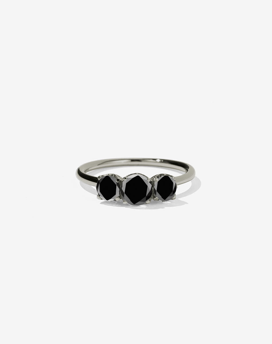 A classic three stone engagement ring in white gold with diamonds.