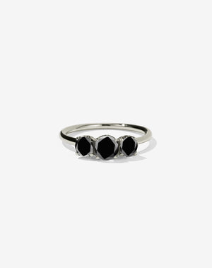 Meadowlark Jewellery’s classic Signature 3 Stone Engagement Ring in 9ct White Gold, with 1ct round brilliant cut black diamonds. Set into our signature Meadowlark claw setting, featuring graphic lines inspired by our insignia. Pair with our bestseller, the Amelie Band Pave or Plain. One of our most timeless and beloved Ceremonial designs, made to order in New Zealand.