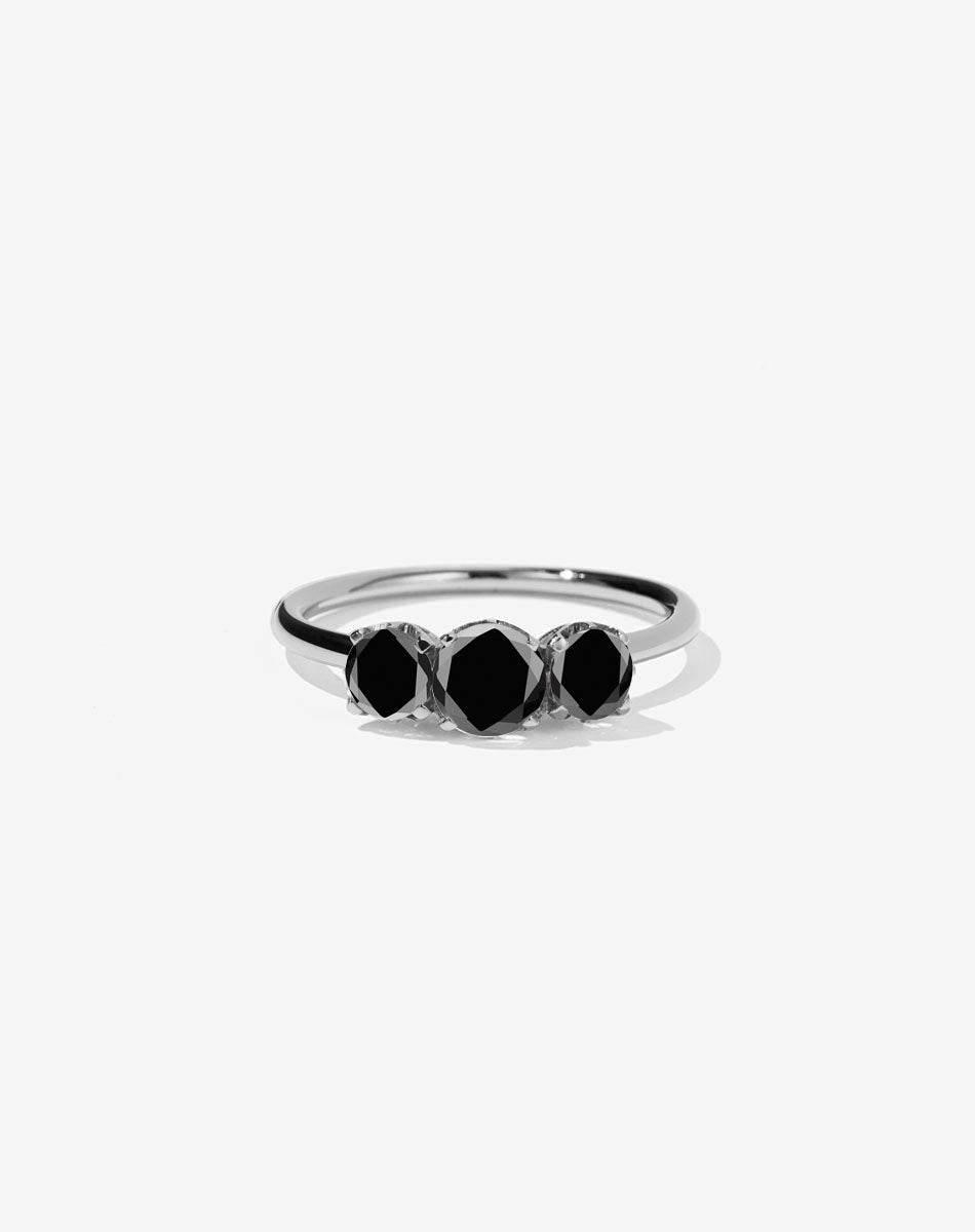 A classic three stone engagement ring in platinum with diamonds.