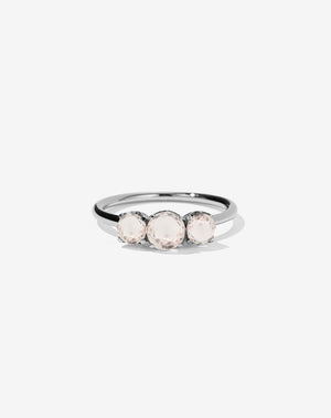 A classic three stone engagement ring in platinum with morganites.