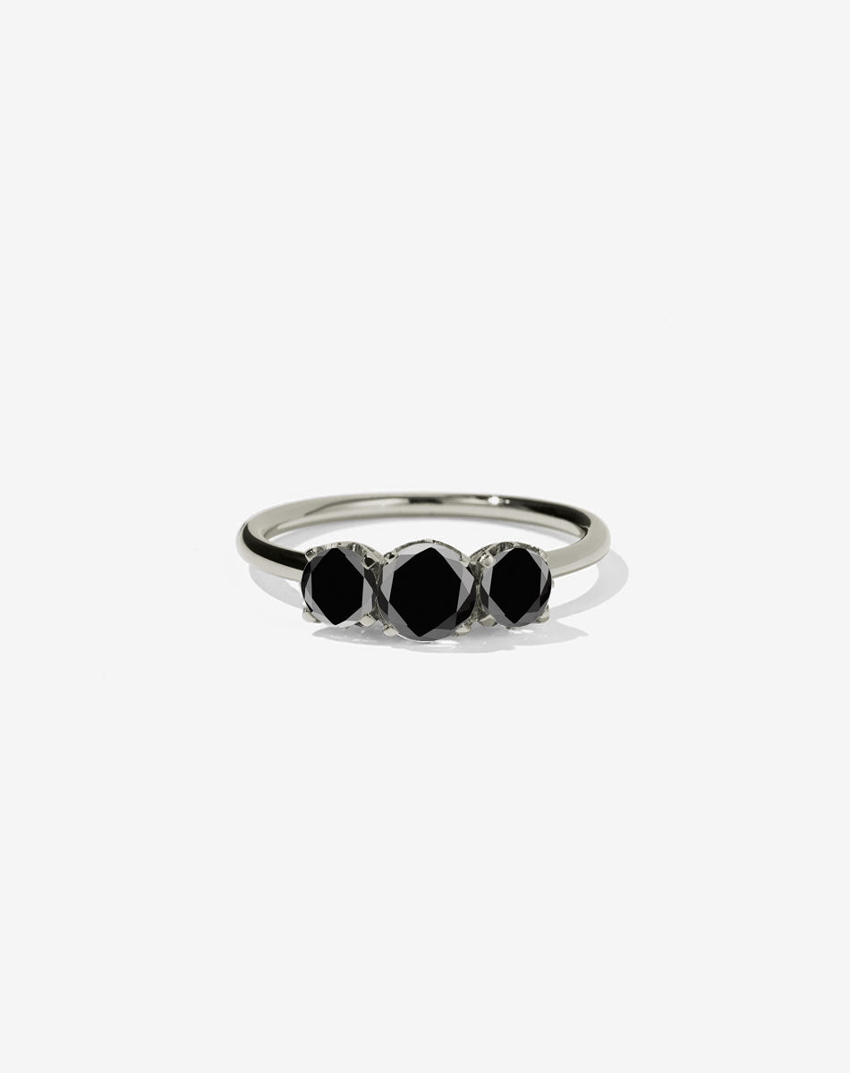 A classic three stone engagement ring in white gold with diamonds.