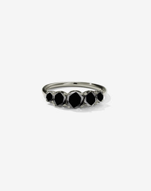 Meadowlark Jewellery’s classic Signature 5 Stone Engagement Ring in 14ct White Gold, with round brilliant cut black diamonds. Set into our signature Meadowlark claw setting, featuring graphic lines inspired by our insignia. Pair with our bestseller, the Amelie Band Pave or Plain. One of our most timeless and beloved Ceremonial designs, made in New Zealand.