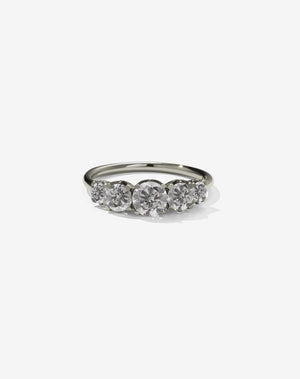 Meadowlark Jewellery’s classic Signature 5 Stone Engagement Ring in 14ct White Gold, with round brilliant cut grey diamonds. Set into our signature Meadowlark claw setting, featuring graphic lines inspired by our insignia. Pair with our bestseller, the Amelie Band Pave or Plain. One of our most timeless and beloved Ceremonial designs, made in New Zealand.