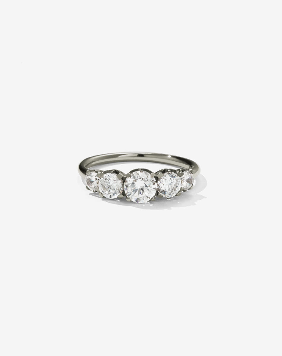 A classic white gold, five stone diamond engagement ring. Set with diamonds.
