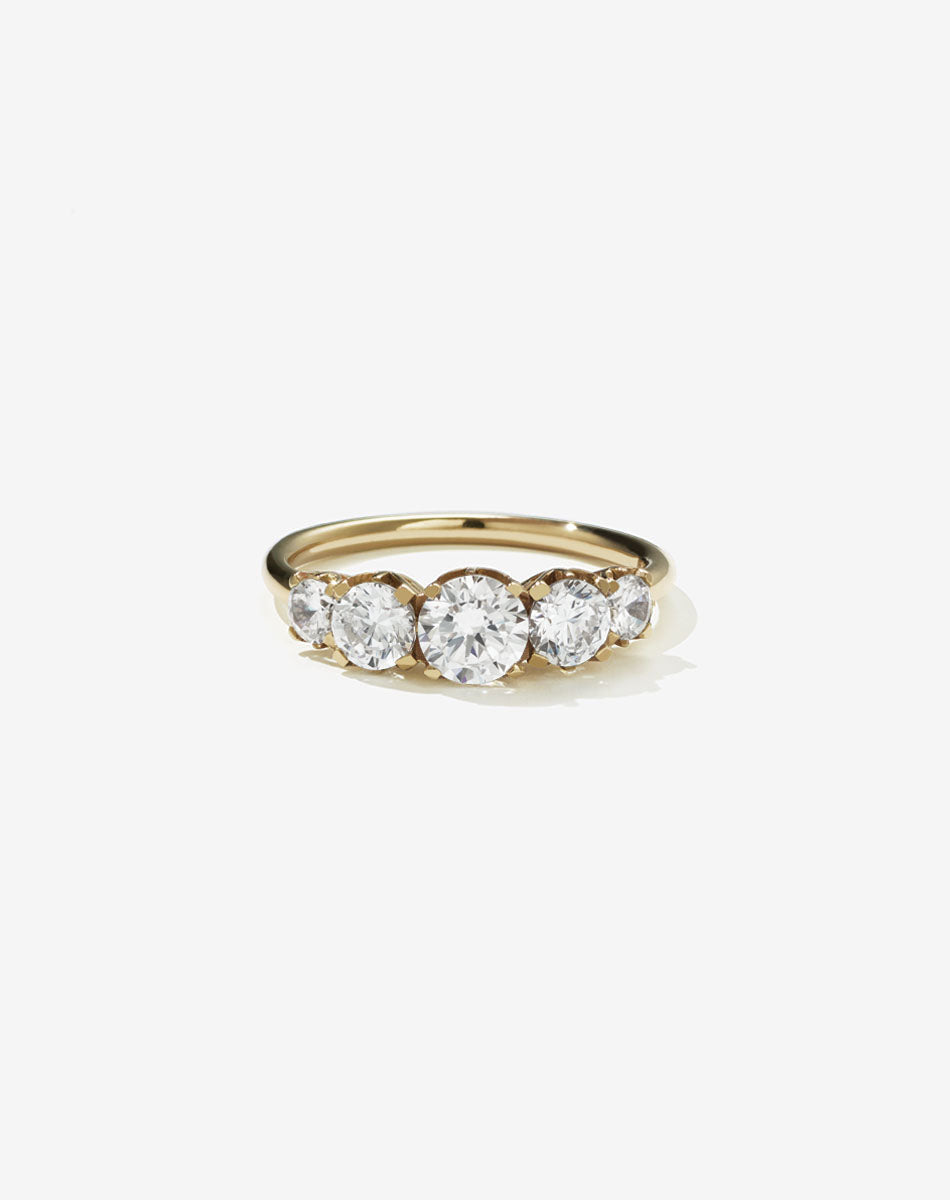 A classic yellow gold, five stone diamond engagement ring. Set with  diamonds.