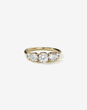 A classic yellow gold, five stone diamond engagement ring. Set with  diamonds.