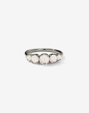A classic white gold, five stone diamond engagement ring. Set with morganites.