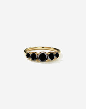 A classic yellow gold, five stone diamond engagement ring. Set with black diamonds.