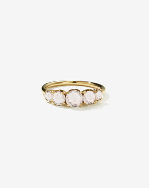 A classic yellow gold, five stone diamond engagement ring. Set with morganites.