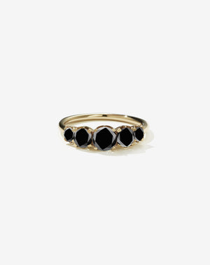 Meadowlark Jewellery’s classic Signature 5 Stone Engagement Ring in 9ct Yellow Gold, with round brilliant cut black diamonds. Set into our signature Meadowlark claw setting, featuring graphic lines inspired by our insignia. Pair with our bestseller, the Amelie Band Pave or Plain. One of our most timeless and beloved Ceremonial designs, made in New Zealand.