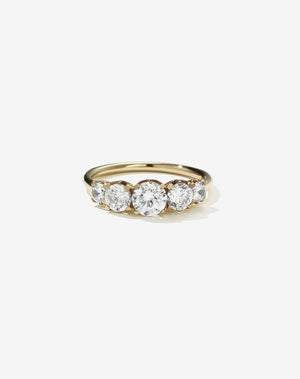 Meadowlark Jewellery’s classic Signature 5 Stone Engagement Ring in 9ct Yellow Gold, with 1.09ct round brilliant cut white diamonds. Set into our signature Meadowlark claw setting, featuring graphic lines inspired by our insignia. Pair with our bestseller, the Amelie Band Pave or Plain. One of our most timeless and beloved Ceremonial designs, made in New Zealand.