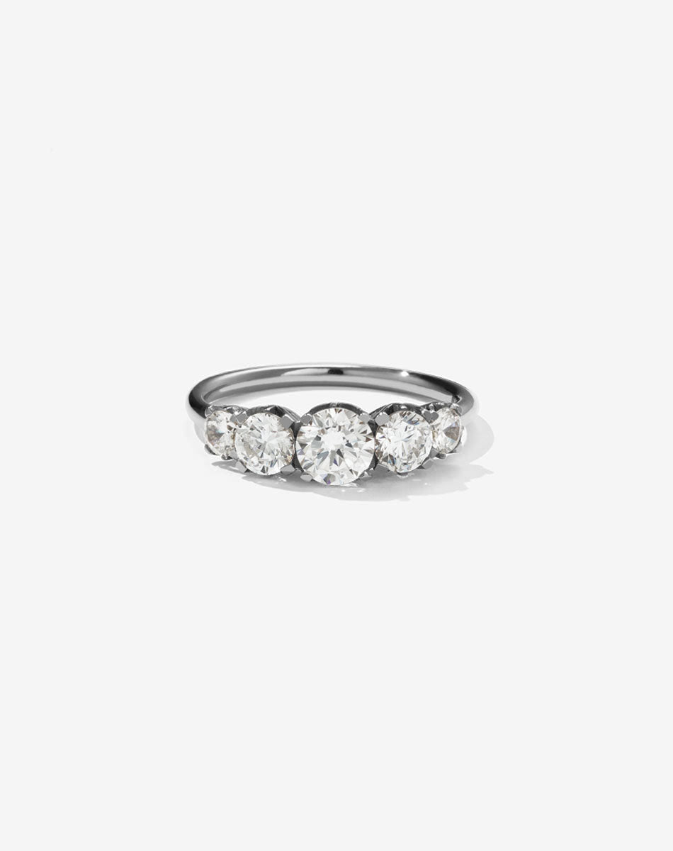 A classic white gold, five stone diamond engagement ring. Set with diamonds.